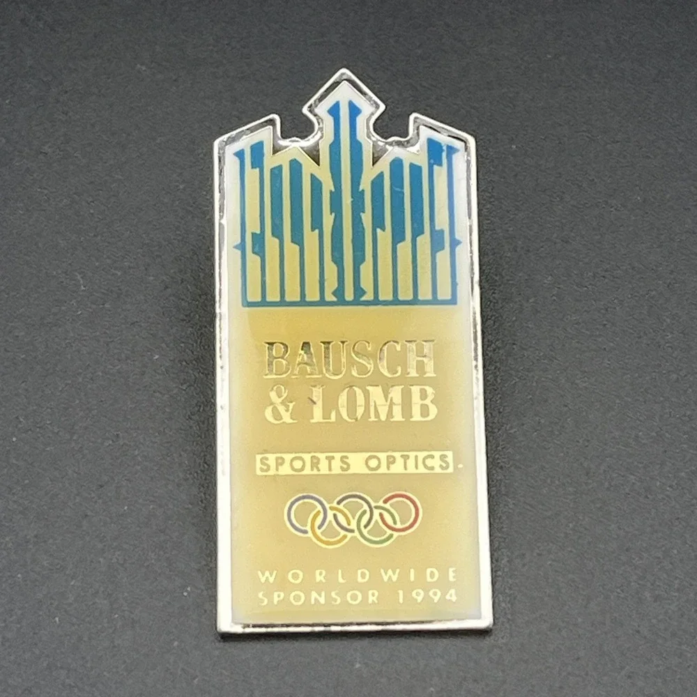 Olympic Winter Games 1994 Lillehammer Bausch & Lomb Optics Sponsor Lapel Hat Pin